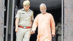 Police produce 2007 Ajmer Bomb Blast case accused Swami Aseemanand in a court in Jaipur.(PTI File Photo) Police produce 2007 Ajmer Bomb Blast case accused Swami Aseemanand in a court in Jaipur.(PTI File Photo)