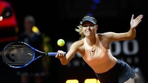 Russia's Maria Sharapova returns the ball to France's Caroline Garcia during their match at the WTA Tennis Grand Prix on Tuesday in Stuttgart.(AFP) Russia's Maria Sharapova returns the ball to France's Caroline Garcia during their match at the WTA Tennis Grand Prix on Tuesday in Stuttgart.(AFP)