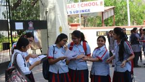 CBSE Class 12 students discussing economics retest paper at GD Goenka Public School, Lucknow on Wednesday.(HT Photo)