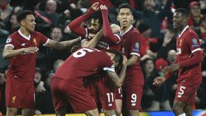 Liverpool FC's Mohamed Salah (C) celebrates with teammates after scoring his second goal against AS Roma in their UEFA Champions League first leg semi-final match at Anfield in Liverpool on Tuesday.(AFP) Liverpool FC's Mohamed Salah (C) celebrates with teammates after scoring his second goal against AS Roma in their UEFA Champions League first leg semi-final match at Anfield in Liverpool on Tuesday.(AFP)
