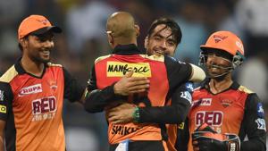 Sunrisers Hydrabad (SRH) spinner Rashid Khan celebrates with teammates after taking the wicket of Mumbai Indans (MI) batsman Keiron Pollard during their 2018 Indian Premier League (IPL 2018) match in Mumbai on Tuesday.(PTI) Sunrisers Hydrabad (SRH) spinner Rashid Khan celebrates with teammates after taking the wicket of Mumbai Indans (MI) batsman Keiron Pollard during their 2018 Indian Premier League (IPL 2018) match in Mumbai on Tuesday.(PTI)