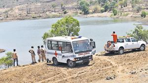 The bodies of two of the three boys who had drowned in the water body, also known as Katarkhadak reservoir, were recovered by rescue teams comprising personnel from National Disaster Rescue Force (NDRF) and locals at the end of a four-hour long search operation on Thursday.(HT PHOTO) The bodies of two of the three boys who had drowned in the water body, also known as Katarkhadak reservoir, were recovered by rescue teams comprising personnel from National Disaster Rescue Force (NDRF) and locals at the end of a four-hour long search operation on Thursday.(HT PHOTO)