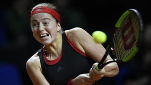 Latvia's Jelena Ostapenko returns the ball to Kazakhstan's Zarina Diyas during their Stuttgart Open match on Thursday.(AFP) Latvia's Jelena Ostapenko returns the ball to Kazakhstan's Zarina Diyas during their Stuttgart Open match on Thursday.(AFP)