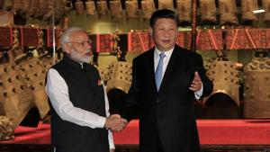 Chinese President Xi Jinping and Prime Minister Narendra Modi shake hands as they visit the Hubei Provincial Museum in Wuhan, Hubei province, China.(Reuters Photo) Chinese President Xi Jinping and Prime Minister Narendra Modi shake hands as they visit the Hubei Provincial Museum in Wuhan, Hubei province, China.(Reuters Photo)