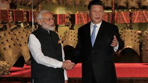 Chinese President Xi Jinping and Prime Minister Narendra Modi shake hands as they visit the Hubei Provincial Museum in Wuhan.(Reuters via China Daily) Chinese President Xi Jinping and Prime Minister Narendra Modi shake hands as they visit the Hubei Provincial Museum in Wuhan.(Reuters via China Daily)