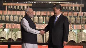 Chinese President Xi Jinping (right) shakes hands with Indian Prime Minister Narendra Modi during their visit at Hubei Provincial museum in Wuhan, China.(Reuters via govt handout) Chinese President Xi Jinping (right) shakes hands with Indian Prime Minister Narendra Modi during their visit at Hubei Provincial museum in Wuhan, China.(Reuters via govt handout)
