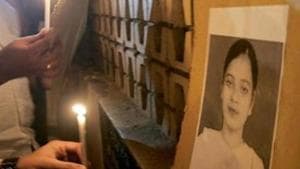 A file photo of demonstrators holding a candlelight vigil for Ishrat Jahan. Ishrat was killed in an alleged encounter by Ahmedabad police in June 2004.(HT Photo) A file photo of demonstrators holding a candlelight vigil for Ishrat Jahan. Ishrat was killed in an alleged encounter by Ahmedabad police in June 2004.(HT Photo)