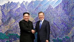 South Korean President Moon Jae-in (R) shakes hands with North Korean leader Kim Jong Un during their meeting at the Peace House at the truce village of Panmunjom inside the demilitarised zone separating the two Koreas, in South Korea, on Friday.(Reuters photo) South Korean President Moon Jae-in (R) shakes hands with North Korean leader Kim Jong Un during their meeting at the Peace House at the truce village of Panmunjom inside the demilitarised zone separating the two Koreas, in South Korea, on Friday.(Reuters photo)
