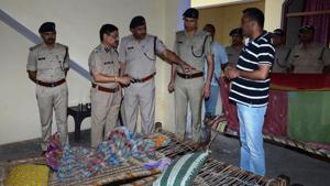 A police team at the crime scene. Police said Pratap Singh Thakur had planned the murders in advance.(HT Photo) A police team at the crime scene. Police said Pratap Singh Thakur had planned the murders in advance.(HT Photo)