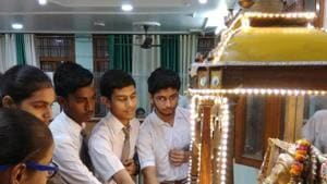 Students of SKD Academy in Lucknow praying a day before UP Board results on Saturday.(HT photo) Students of SKD Academy in Lucknow praying a day before UP Board results on Saturday.(HT photo)