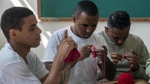 Inmates crochet clothing as part of Ponto Firme project.(AFP) Inmates crochet clothing as part of Ponto Firme project.(AFP)