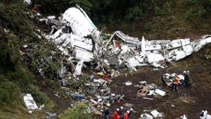Rescue workers recover a body from the wreckage site of the LaMia chartered airplane crash, in La Union, a mountainous area near Medellin, Colombia.(AP File Photo) Rescue workers recover a body from the wreckage site of the LaMia chartered airplane crash, in La Union, a mountainous area near Medellin, Colombia.(AP File Photo)