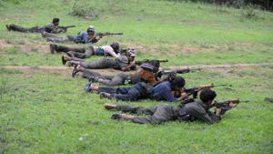 Maoists ready their weapons as they take part in a training camp in Bijapur district in Chhattisgarh in July 8, 2012.(AFP File Photo) Maoists ready their weapons as they take part in a training camp in Bijapur district in Chhattisgarh in July 8, 2012.(AFP File Photo)