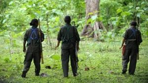 In this file photo taken on July 6, 2012, Maoists patrol their village in Bijapur district in Chhattisgarh.(AFP) In this file photo taken on July 6, 2012, Maoists patrol their village in Bijapur district in Chhattisgarh.(AFP)