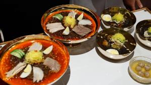 This picture taken on April 27, 2018 shows North Korea's signature dish of cold noodles served by Okryu-gwan, a famed restaurant in Pyongyang, during the official dinner of the inter-Korean summit in the truce village of Panmunjom.(AFP) This picture taken on April 27, 2018 shows North Korea's signature dish of cold noodles served by Okryu-gwan, a famed restaurant in Pyongyang, during the official dinner of the inter-Korean summit in the truce village of Panmunjom.(AFP)