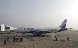 Indigo Airlines' ground staff stand next to an aircraft after it arrived at the Srinagar airport.(Reuters File Photo) Indigo Airlines' ground staff stand next to an aircraft after it arrived at the Srinagar airport.(Reuters File Photo)