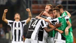 Juventus players celebrate after their win over Inter Milan in Serie A at San Siro, Milan, on Saturday.(Reuters) Juventus players celebrate after their win over Inter Milan in Serie A at San Siro, Milan, on Saturday.(Reuters)