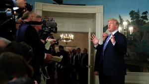US President Donald Trump responds to reporters' questions in the Diplomatic Room of the White House in Washington on March 23.(AP file photo) US President Donald Trump responds to reporters' questions in the Diplomatic Room of the White House in Washington on March 23.(AP file photo)