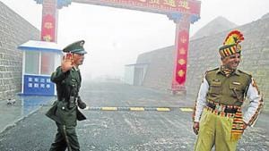 This file photo taken on July 10, 2008 shows a Chinese soldier (L) next to an Indian soldier at the Nathu La border crossing between India and China in Sikkim.(AFP File Photo) This file photo taken on July 10, 2008 shows a Chinese soldier (L) next to an Indian soldier at the Nathu La border crossing between India and China in Sikkim.(AFP File Photo)