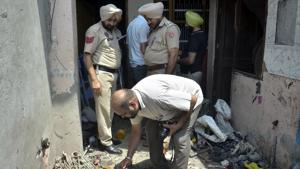 Police and forensic experts inspecting the spot, where the explosion took place, killing Vikram Singh, in Patiala on Sunday.(Bharat Bhushan/HT) Police and forensic experts inspecting the spot, where the explosion took place, killing Vikram Singh, in Patiala on Sunday.(Bharat Bhushan/HT)