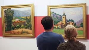Visitors look at the painting "Le clocher de Ria" (The bell tower of Ria) at the musuem dedicated to French painter Etienne Terrus, in France.(AFP) Visitors look at the painting "Le clocher de Ria" (The bell tower of Ria) at the musuem dedicated to French painter Etienne Terrus, in France.(AFP)