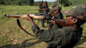 Maoists train in a forested area at Dumariya block in Gaya district recently.(AP File) Maoists train in a forested area at Dumariya block in Gaya district recently.(AP File)
