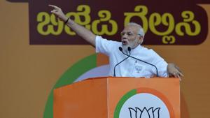 Prime Minister Narendra Modi gestures to supporters during an election campaign rally in Bangalore on May 3.(AFP Photo) Prime Minister Narendra Modi gestures to supporters during an election campaign rally in Bangalore on May 3.(AFP Photo)