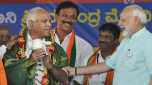 Prime Minister Narendra Modi and BJP's chief ministerial candidate BS Yeddyurappa share a lighter moment during Karnataka election campaign rally at Chamarajanagar on Tuesday.(PTI File Photo) Prime Minister Narendra Modi and BJP's chief ministerial candidate BS Yeddyurappa share a lighter moment during Karnataka election campaign rally at Chamarajanagar on Tuesday.(PTI File Photo)