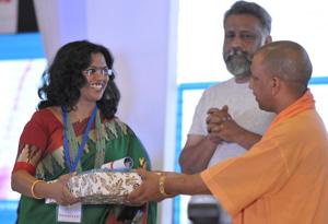 Tulika receiving the award from UP chief minister Yogi Adityanath.(HT Photo)