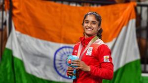 Vinesh Phogat, from the Phogat famlily which broke a glass ceiling in Indian wrestling through their champion women grapplers, celebrates her gold medal at in the women’s 55kg event at the 2018 Commonwealth Games (CWG 2018) in Gold Coast last month.(PTI) Vinesh Phogat, from the Phogat famlily which broke a glass ceiling in Indian wrestling through their champion women grapplers, celebrates her gold medal at in the women’s 55kg event at the 2018 Commonwealth Games (CWG 2018) in Gold Coast last month.(PTI)