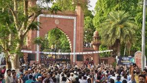 Protest outside the gate of Aligarh Muslim University campus in Aligarh on May 3.(PTI Photo) Protest outside the gate of Aligarh Muslim University campus in Aligarh on May 3.(PTI Photo)