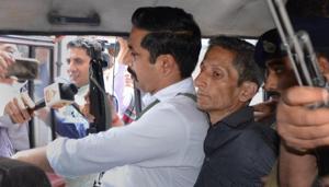 Police produce Vijay Singh, who allegedly shot dead assistant town and country planning officer Shail Bala during an anti-demolition drive on May 1, in a court in Kasauli on May 4.(PTI Photo) Police produce Vijay Singh, who allegedly shot dead assistant town and country planning officer Shail Bala during an anti-demolition drive on May 1, in a court in Kasauli on May 4.(PTI Photo)