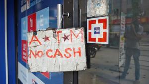 File photo of an ATM facility with a ‘no cash’ sign in Bengaluru on April 18.(REUTERS) File photo of an ATM facility with a ‘no cash’ sign in Bengaluru on April 18.(REUTERS)