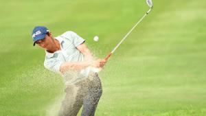 Ajeetesh Sandhu started the day with birdie-birdie to take sole lead, dropped a bogey on third and a double on fifth and later ended bogey-bogey on 17-18.(AFP) Ajeetesh Sandhu started the day with birdie-birdie to take sole lead, dropped a bogey on third and a double on fifth and later ended bogey-bogey on 17-18.(AFP)