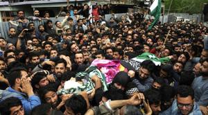 Villagers carry the body of deceased Mohammad Rafi Bhat an assistant professor during his funeral procession at his home district of Ganderbal in central Kashmir.(Waseem Andrabi / Hindustan Times) Villagers carry the body of deceased Mohammad Rafi Bhat an assistant professor during his funeral procession at his home district of Ganderbal in central Kashmir.(Waseem Andrabi / Hindustan Times)