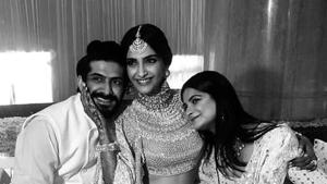 Sonam Kapoor with brother Hashvardhan and Rhea at her mehendi party.(Instagram) Sonam Kapoor with brother Hashvardhan and Rhea at her mehendi party.(Instagram)