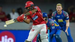 Kings XI Punjab’s (KXIP’s) KL Rahul hits a boundary as Rajasthan Royals’ Jos Buttler (C) and Ben Stokes look on during the 2018 Indian Premier League (IPL 2018) match at the Holkar Cricket Stadium in Indore on Sunday.(AFP) Kings XI Punjab’s (KXIP’s) KL Rahul hits a boundary as Rajasthan Royals’ Jos Buttler (C) and Ben Stokes look on during the 2018 Indian Premier League (IPL 2018) match at the Holkar Cricket Stadium in Indore on Sunday.(AFP)