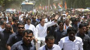 Congress party president Rahul Gandhi rides a bicycle and waves to his supporters while campaigning in Malur on May 7.(AP Photo) Congress party president Rahul Gandhi rides a bicycle and waves to his supporters while campaigning in Malur on May 7.(AP Photo)