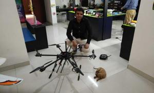 Milind Raj’s rescue of the puppy using a robotic arm went viral on social media.(HT Photo) Milind Raj’s rescue of the puppy using a robotic arm went viral on social media.(HT Photo)