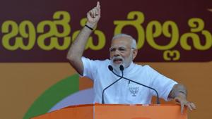 Prime Minister Narendra Modi gestures to supporters during an election rally in Bangalore, May 3(AFP) Prime Minister Narendra Modi gestures to supporters during an election rally in Bangalore, May 3(AFP)