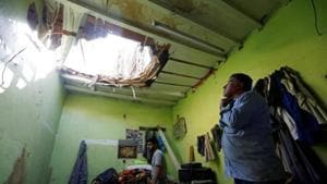 People check the damage after debris from ballistic missiles fired by Yemen's Houthi militia fell onto a house in Riyadh.(REUTERS File Photo) People check the damage after debris from ballistic missiles fired by Yemen's Houthi militia fell onto a house in Riyadh.(REUTERS File Photo)