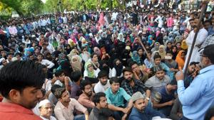 Aligarh Muslim University students stage a protest over the Jinnah portrait issue in Aligarh on Sunday.(PTI) Aligarh Muslim University students stage a protest over the Jinnah portrait issue in Aligarh on Sunday.(PTI)