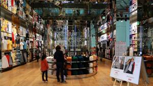 Customers browse clothing on display at the flagship Uniqlo store, operated by Fast Retailing Co., in Osaka, Japan.(Buddhika Weerasinghe/Bloomberg) Customers browse clothing on display at the flagship Uniqlo store, operated by Fast Retailing Co., in Osaka, Japan.(Buddhika Weerasinghe/Bloomberg)