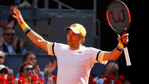 Dusan Lajovic celebrates winning his third round match against Juan Martin del Potro at the Madrid Open tennis tournament on Thursday.(REUTERS) Dusan Lajovic celebrates winning his third round match against Juan Martin del Potro at the Madrid Open tennis tournament on Thursday.(REUTERS)