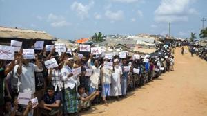 Rohingya refugees holing placards, await the arrival of a U.N. Security Council team at the Kutupalong Rohingya refugee camp in Kutupalong, Bangladesh, Sunday, April 29, 2018.(AP File Photo) Rohingya refugees holing placards, await the arrival of a U.N. Security Council team at the Kutupalong Rohingya refugee camp in Kutupalong, Bangladesh, Sunday, April 29, 2018.(AP File Photo)