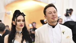 Grimes, left, and Elon Musk attend The Metropolitan Museum of Art's Costume Institute benefit gala celebrating the opening of the Heavenly Bodies: Fashion and the Catholic Imagination exhibition.(Charles Sykes/Invision/AP) Grimes, left, and Elon Musk attend The Metropolitan Museum of Art's Costume Institute benefit gala celebrating the opening of the Heavenly Bodies: Fashion and the Catholic Imagination exhibition.(Charles Sykes/Invision/AP)