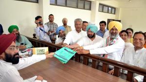 Congress candidate Hardev Singh Laddi Sherowalia along with CM Amarinder Singh and other Congress leaders filling his nomination papers for the Shahkot assembly bypoll, at Shahkot on Thursday.(Pardeep Pandit/HT) Congress candidate Hardev Singh Laddi Sherowalia along with CM Amarinder Singh and other Congress leaders filling his nomination papers for the Shahkot assembly bypoll, at Shahkot on Thursday.(Pardeep Pandit/HT)