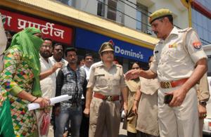 Shahjahanpur woman who has accused Shahjahanpur BJP MLA Roshan Lal Verma's son of raping her, in a scuffle with women police outside a hotel where the BJP lawmaker was addressing a press conference to counter the allegations at Shajahanpur.(Dheeraj Dhawan/HT Photo) Shahjahanpur woman who has accused Shahjahanpur BJP MLA Roshan Lal Verma's son of raping her, in a scuffle with women police outside a hotel where the BJP lawmaker was addressing a press conference to counter the allegations at Shajahanpur.(Dheeraj Dhawan/HT Photo)