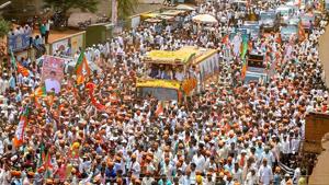 BJP President Amit Shah during a roadshow for an election campaign ahead of Karnataka Assembly elections in Badami on Thursday.(PTI Photo) BJP President Amit Shah during a roadshow for an election campaign ahead of Karnataka Assembly elections in Badami on Thursday.(PTI Photo)