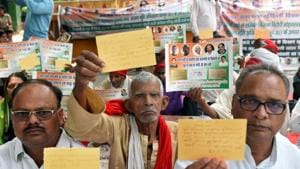 Farmers from Varanasi hold letters written to Prime Minister Narendra Modi as they protest on the issue of poor conditions of farmers, at Jantar Mantar in New Delhi, on April 30.(HT FILE PHOTO) Farmers from Varanasi hold letters written to Prime Minister Narendra Modi as they protest on the issue of poor conditions of farmers, at Jantar Mantar in New Delhi, on April 30.(HT FILE PHOTO)